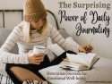 Young girl with mug sitting on bed and writting her daily journal for emotional well-being
